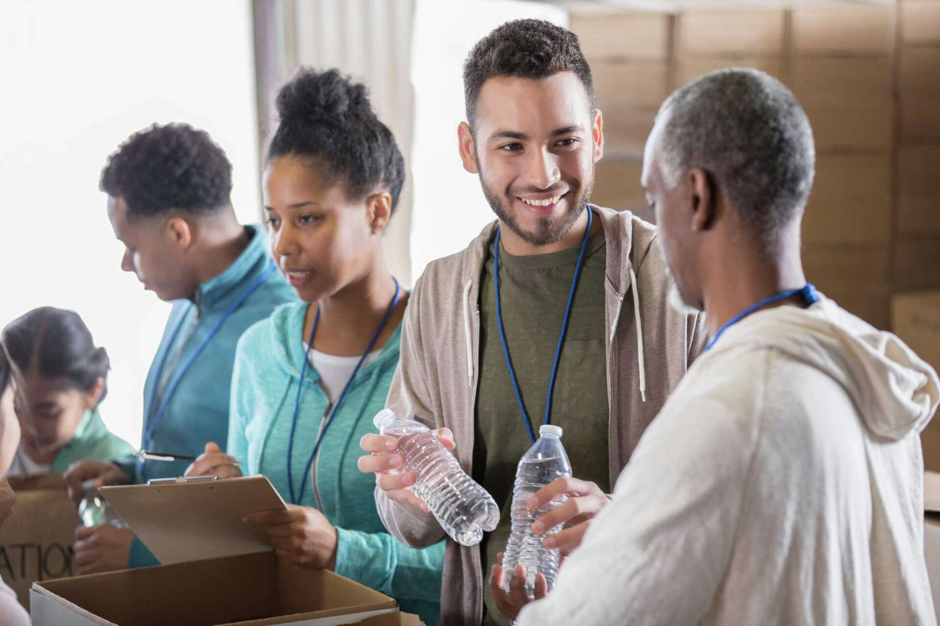 Volunteers preparing community support boxes