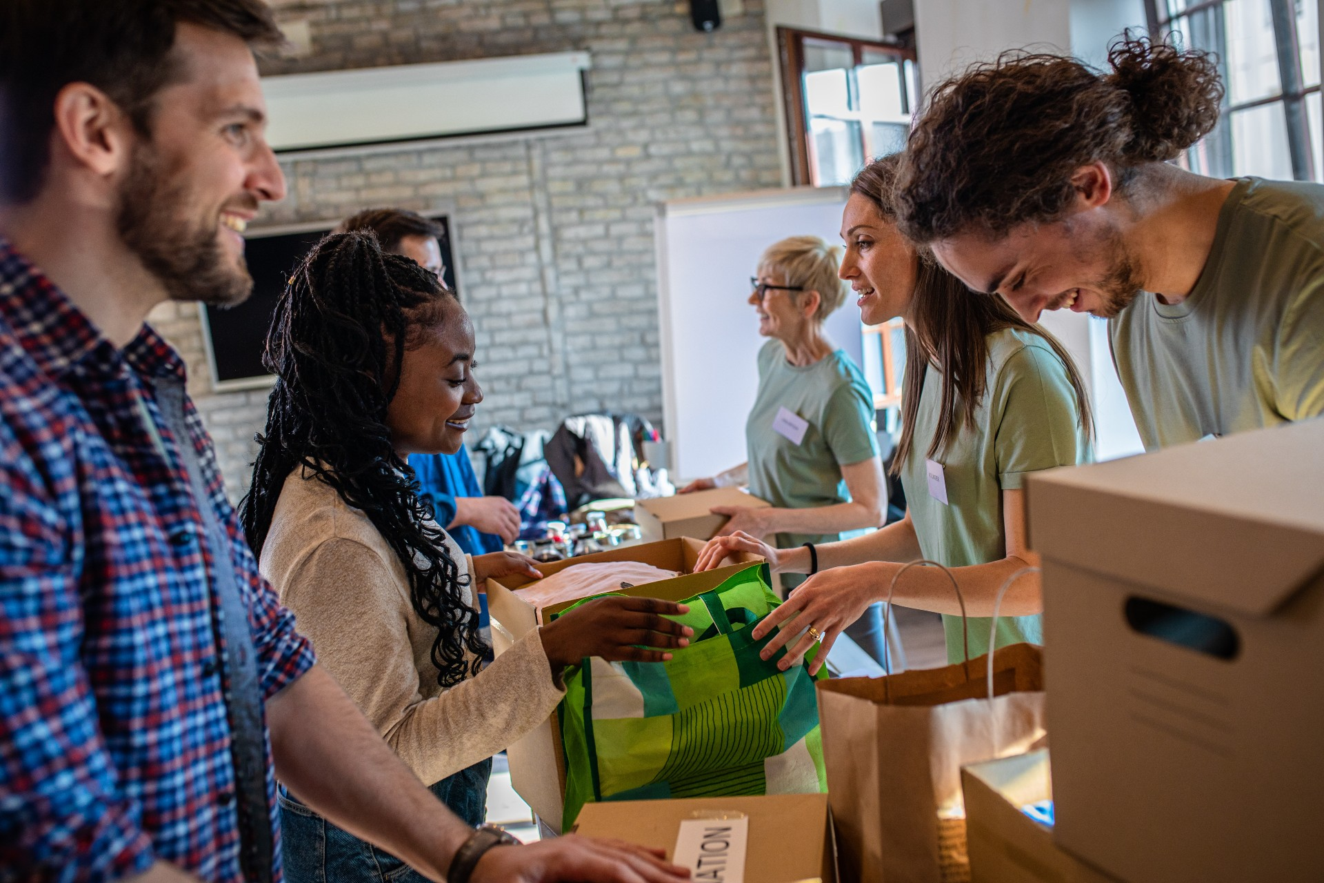 Volunteers preparing donated goods