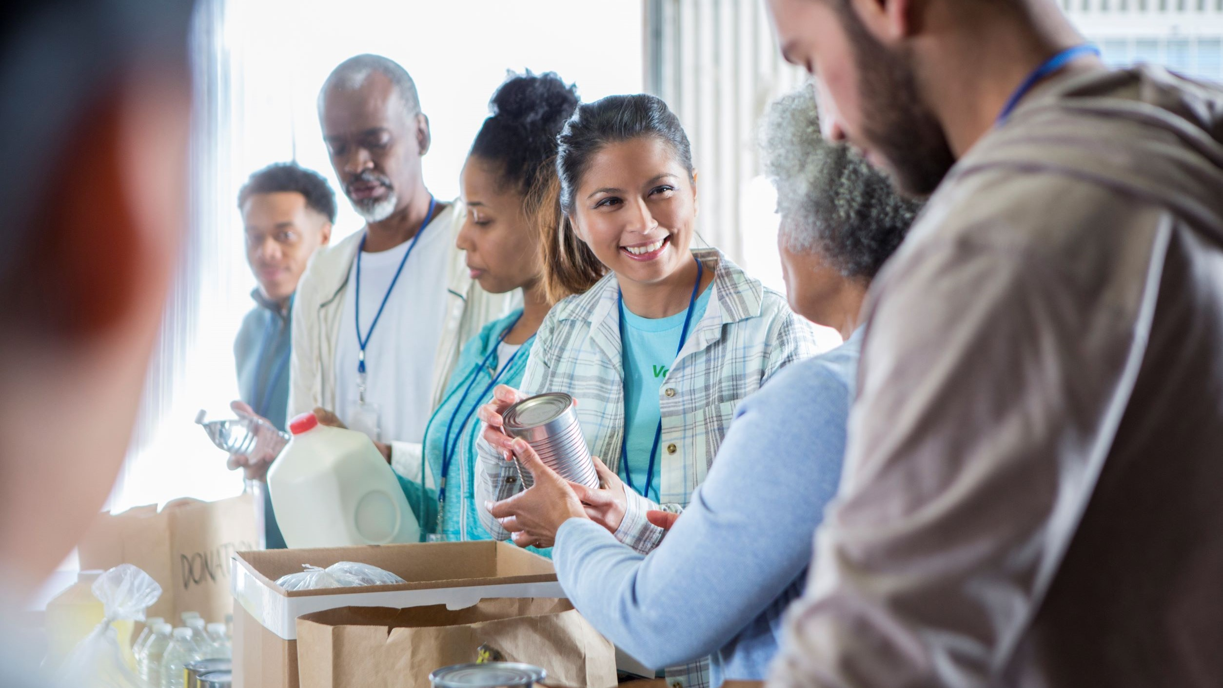 Healthcare staff speaking with a community member